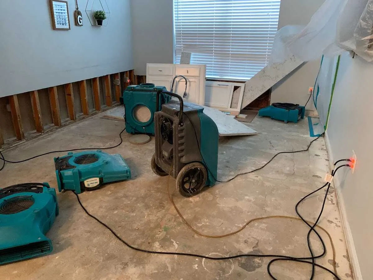 Dehumidifier in flood-cut room for Water Damage Restoration in Big Lake